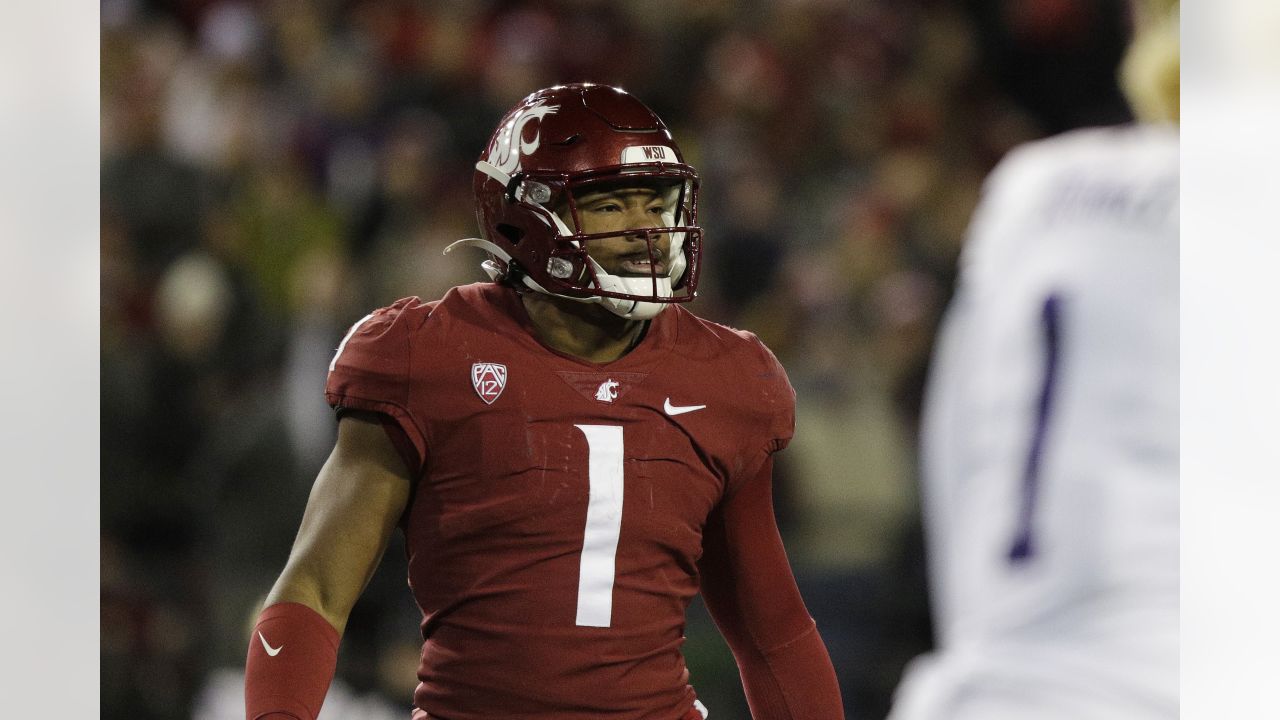 Washington State linebacker Daiyan Henley stands on the field during the  second half of an NCAA college football game against Utah, Thursday, Oct.  27, 2022, in Pullman, Wash. (AP Photo/Young Kwak Stock