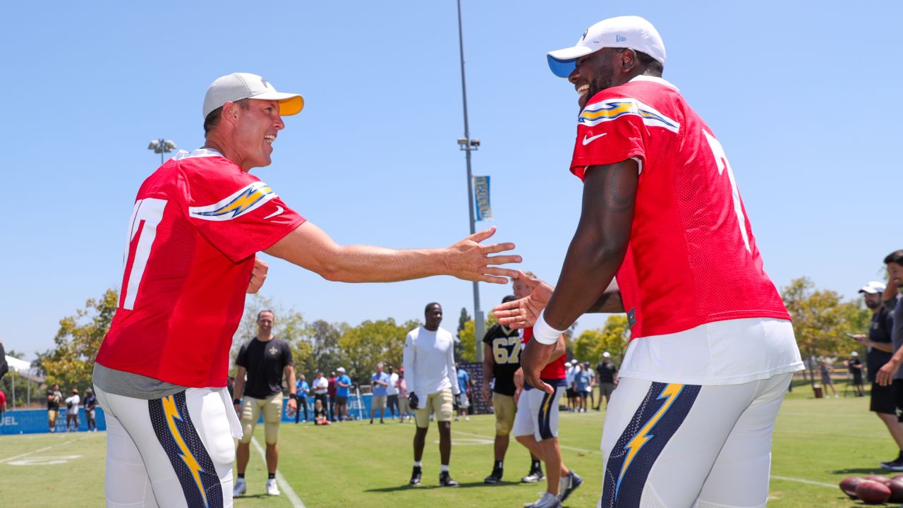 ADVANCE FOR WEEKEND EDITIONS JAN. 19-21 ** FILE ** Quarterback Philip  Rivers holds up his San Diego Chargers jersey at a news conference at the  Chargers' facility in San Diego in