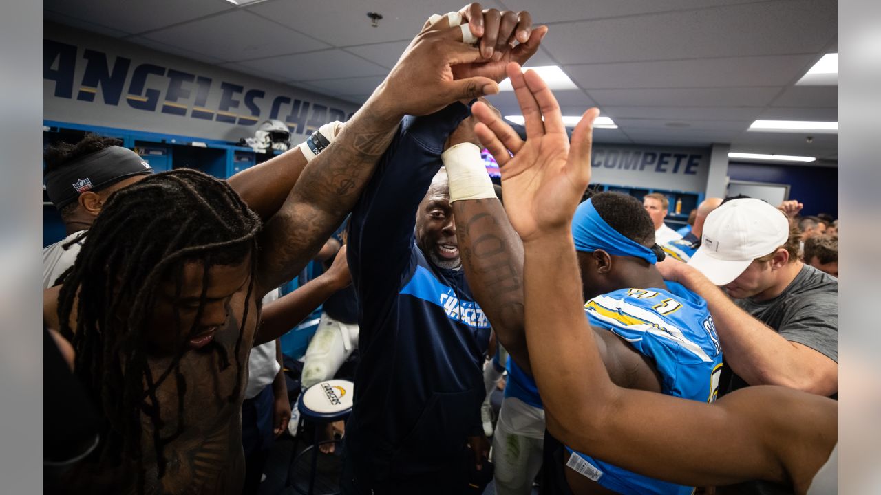 Locker room celebration after comeback victory vs. Raiders