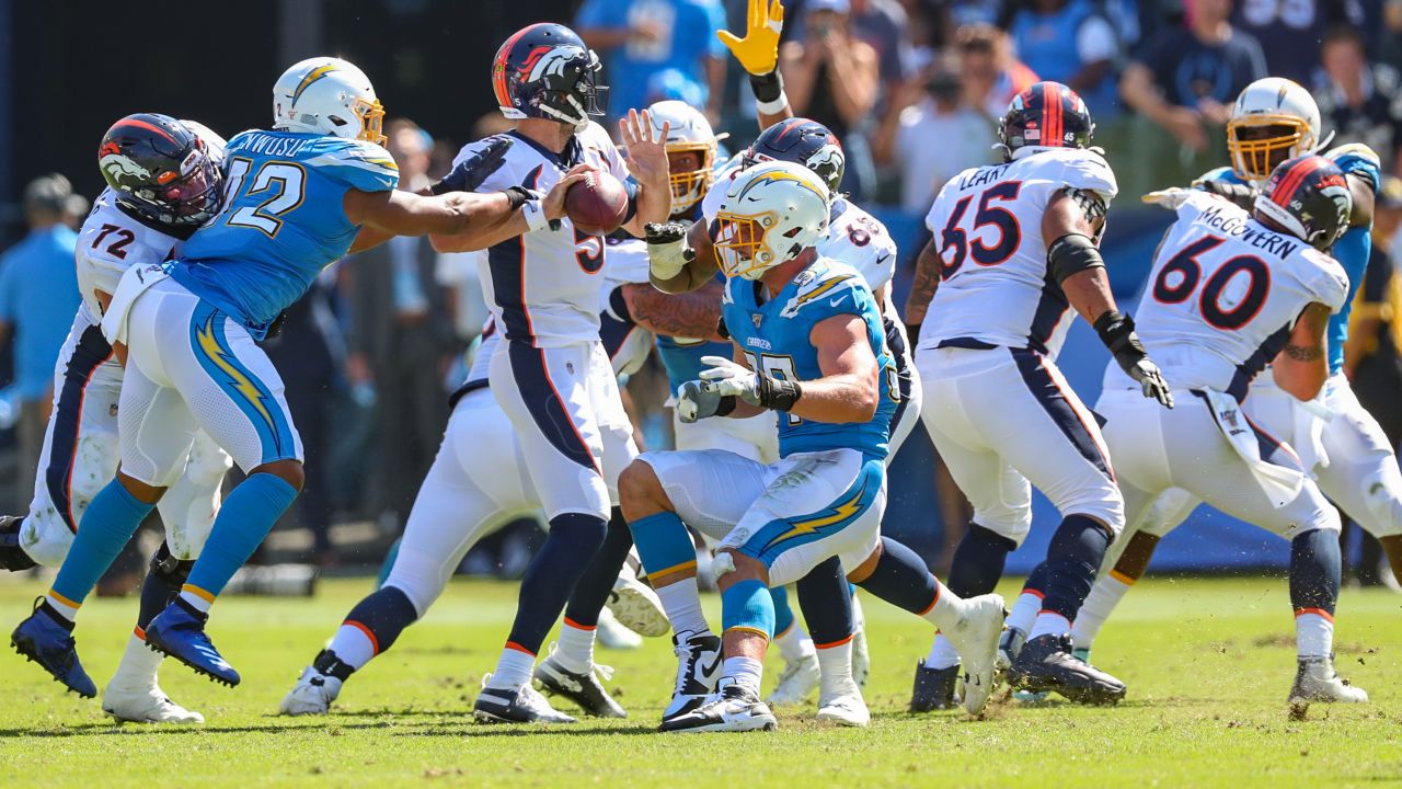 Denver Broncos vs. Los Angeles Chargers. Fans support on NFL Game.  Silhouette of supporters, big screen with two rivals in background Stock  Photo - Alamy