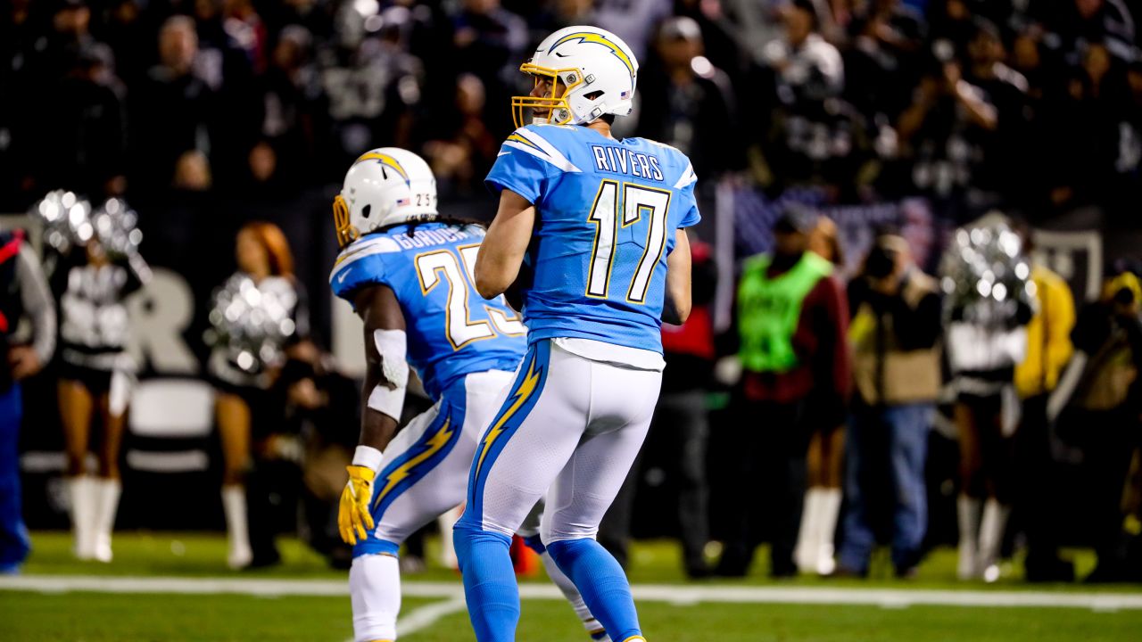 Los Angeles Chargers running back Melvin Gordon (28) runs the ball against  the Oakland Raiders during an NFL football game Sunday, Nov. 11, 2018, in  Oakland, CA. The Chargers won 20-6. (Daniel