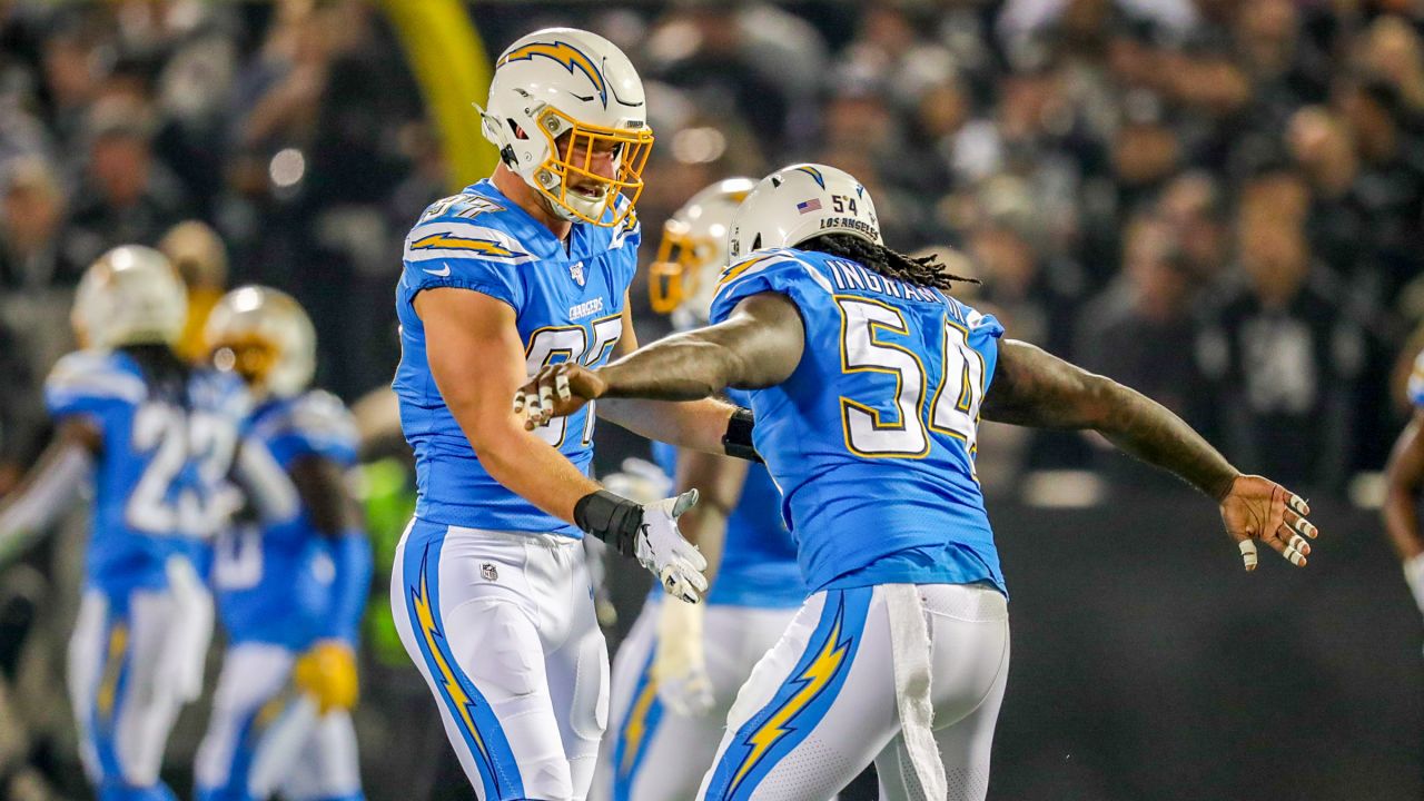 Los Angeles Chargers running back Melvin Gordon (28) runs the ball against  the Oakland Raiders during an NFL football game Sunday, Nov. 11, 2018, in  Oakland, CA. The Chargers won 20-6. (Daniel