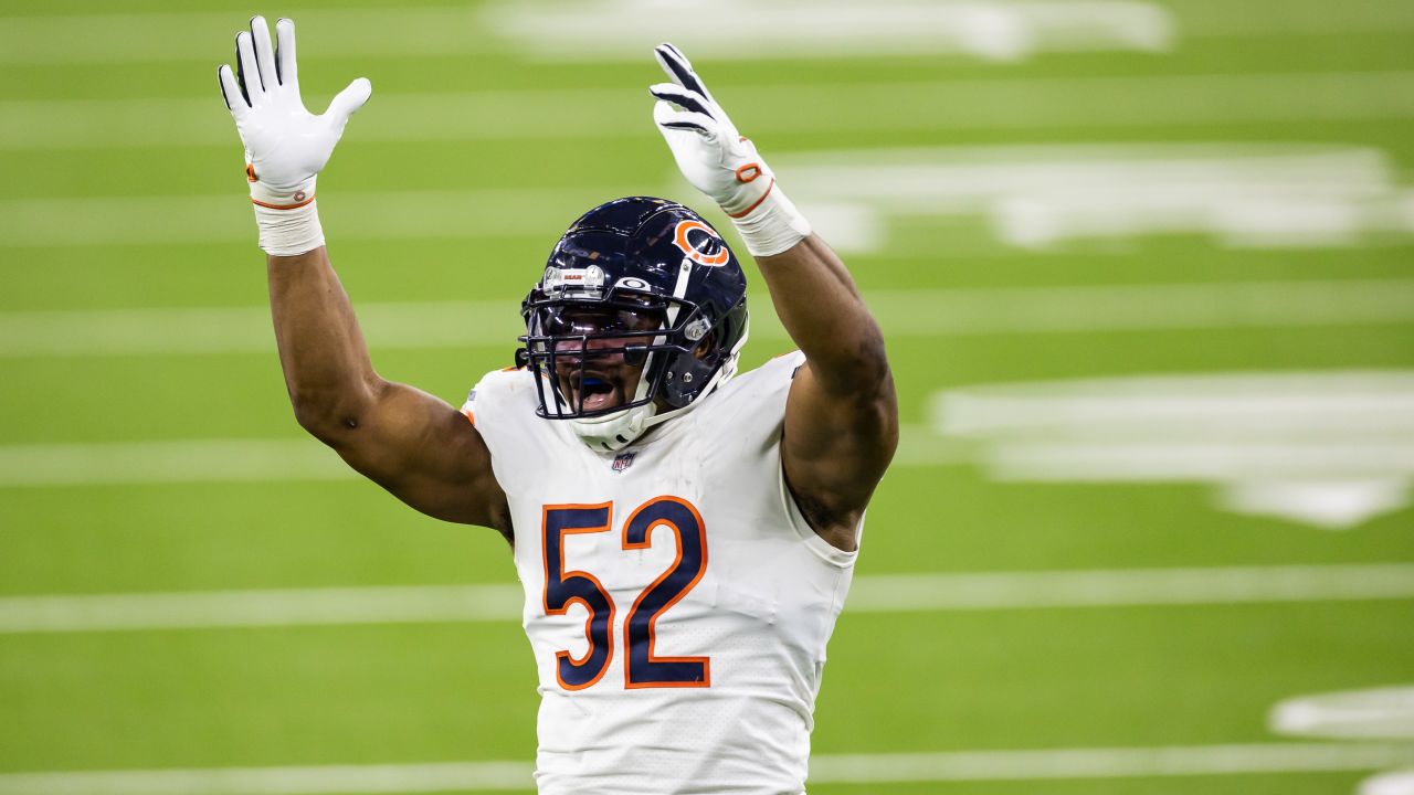 Chicago Bears outside linebacker Khalil Mack (52) celebrates a big  defensive play in the second …