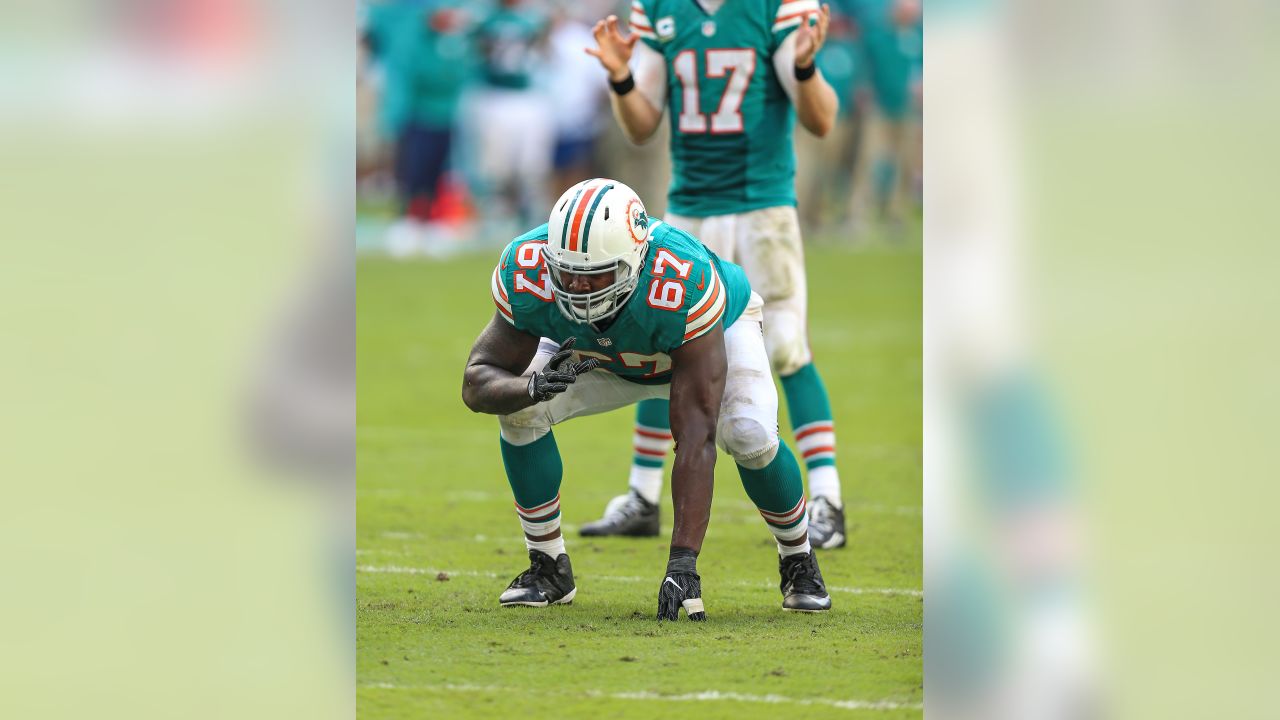 Buffalo Bills defensive end Ryan Denney (92) hits Miami Dolphins