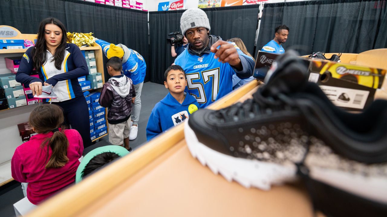 Chargers players join Santa Ana elementary school students for shoe  giveaway – Orange County Register