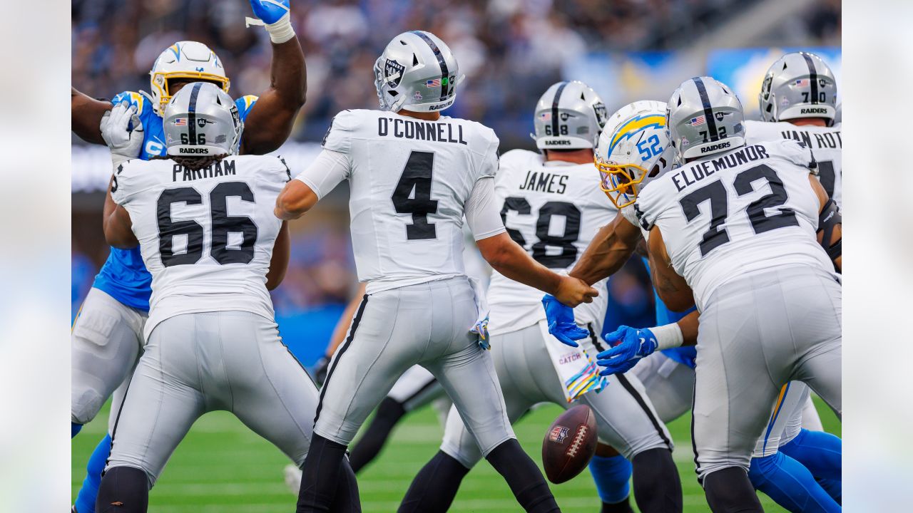 Oakland Raiders defensive end Khalil Mack (52) battles through the