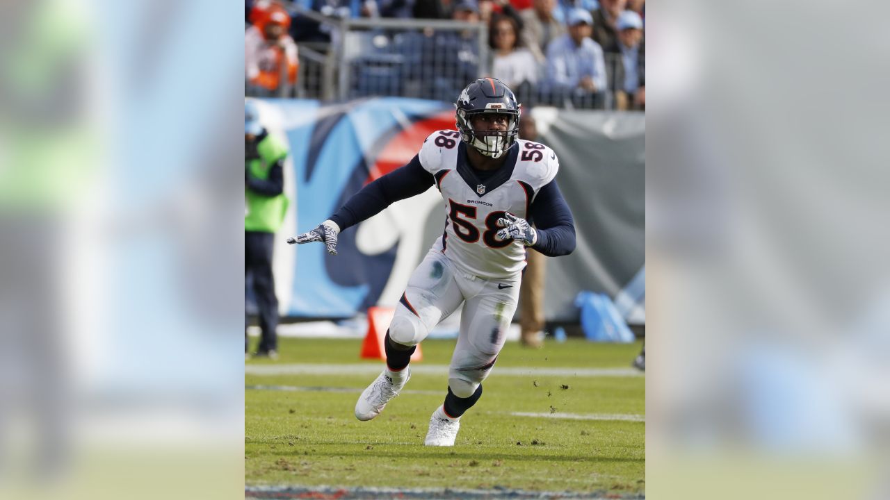 Denver Broncos linebacker Von Miller (58) and linebacker Alexander Johnson  (45) follow a play during the first half of an NFL football game against  the Jacksonville Jaguars, Sunday, Sept. 19, 2021, in