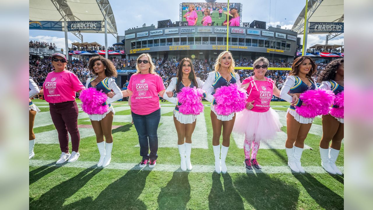 Breast cancer survivor surprised by happy homecoming at Bucs game