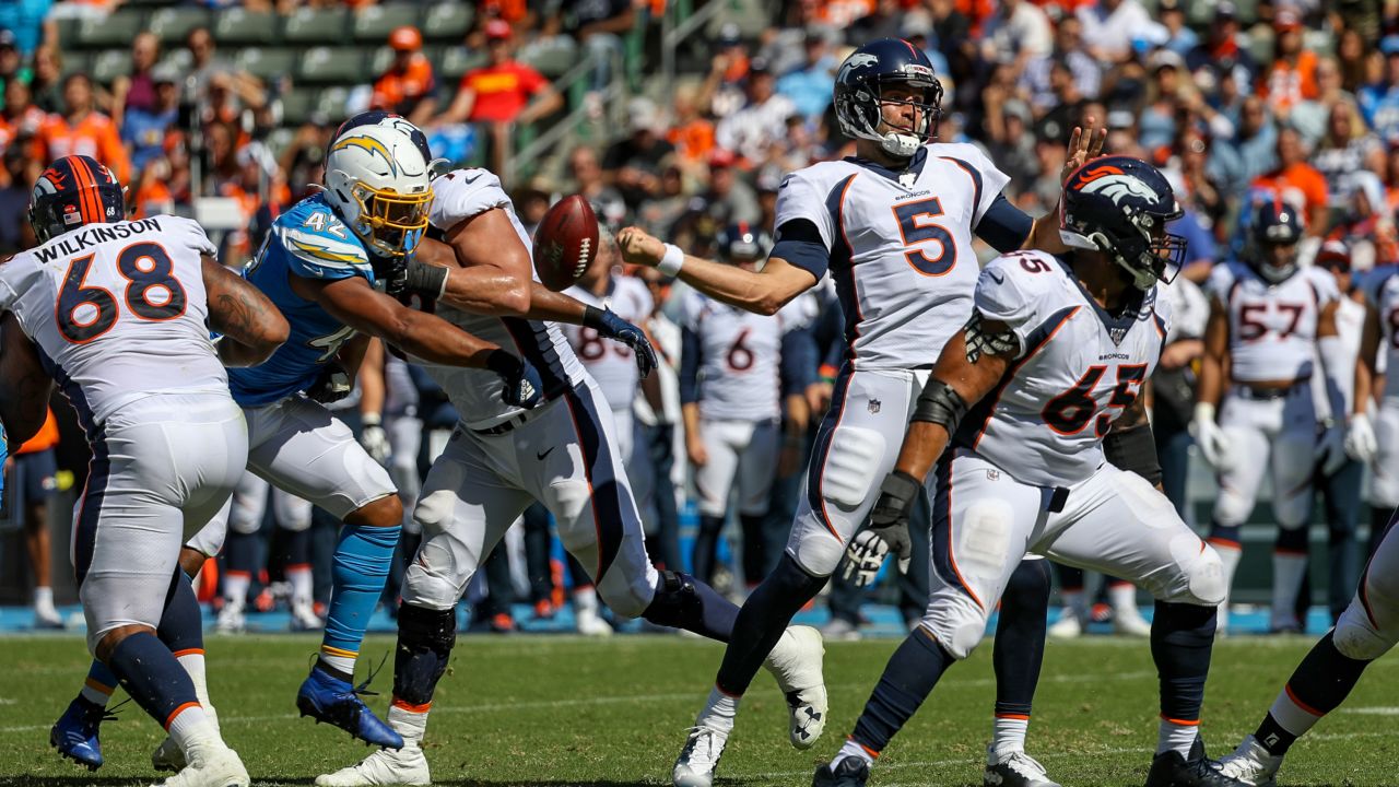 Denver Broncos vs. Los Angeles Chargers. Fans support on NFL Game.  Silhouette of supporters, big screen with two rivals in background Stock  Photo - Alamy