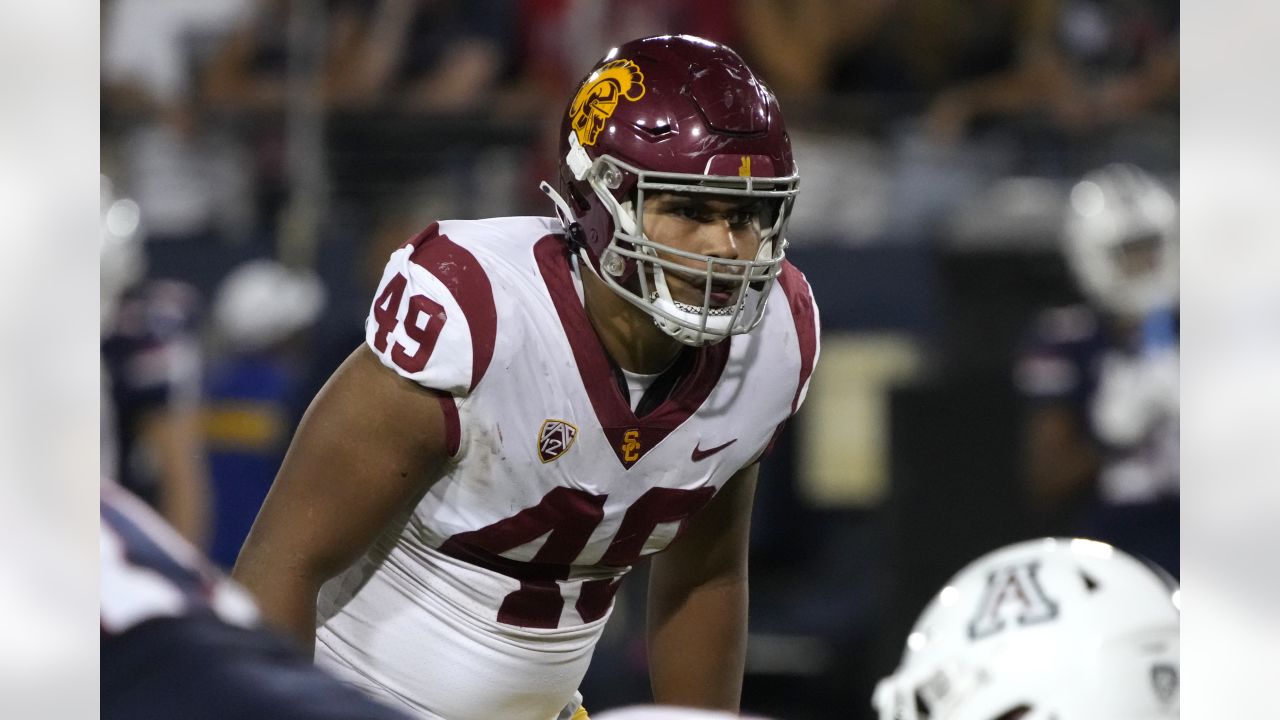 NFL draft: Chargers select USC DE Tuli Tuipulotu, Washington State