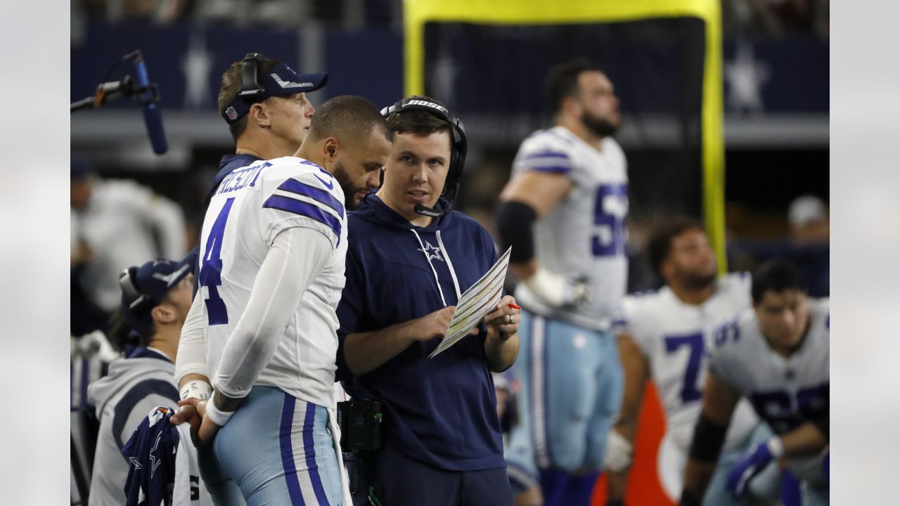 Dallas Cowboys head coach Mike McCarthy, left, and offensive coordinator  Kellen Moore, right watch from the sidelines during an NFL Football game  against the Houston Texans in Arlington, Texas, Saturday, Aug. 21