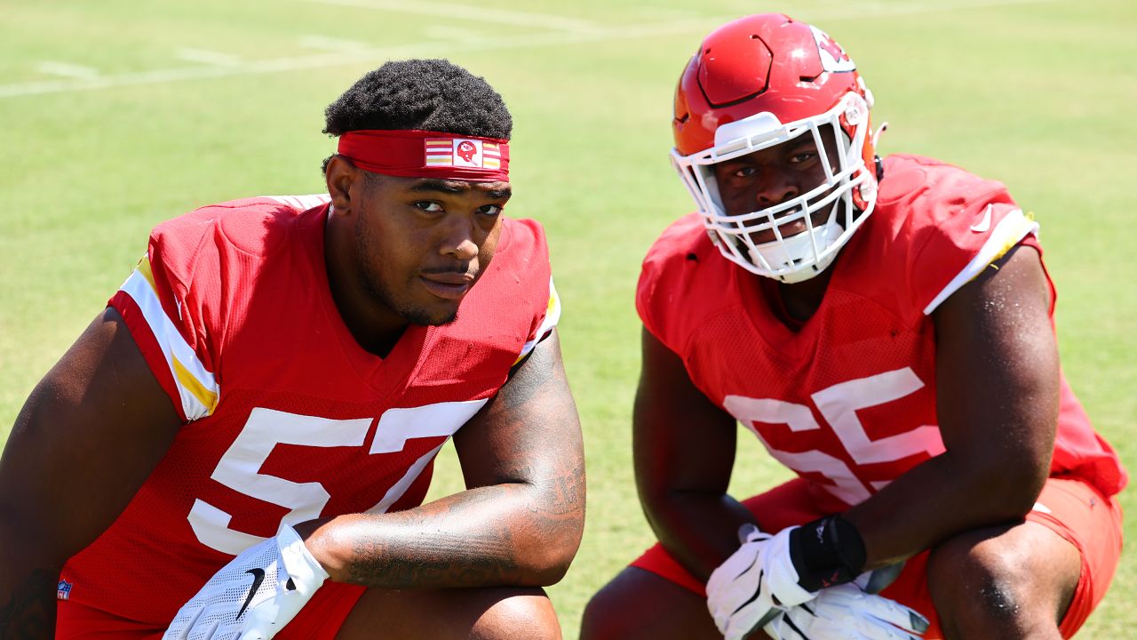 Kansas City Chiefs guard Trey Smith (65) blocks against the Las