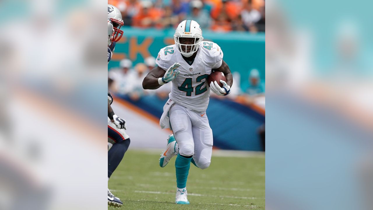 Finnegan returns to practice for Dolphins; Wallace, Misi not