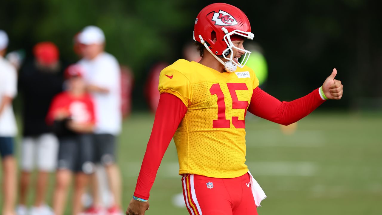 Picture of QB1 from first day of training camp. Rocking the red jersey and  even a visor on his helmet