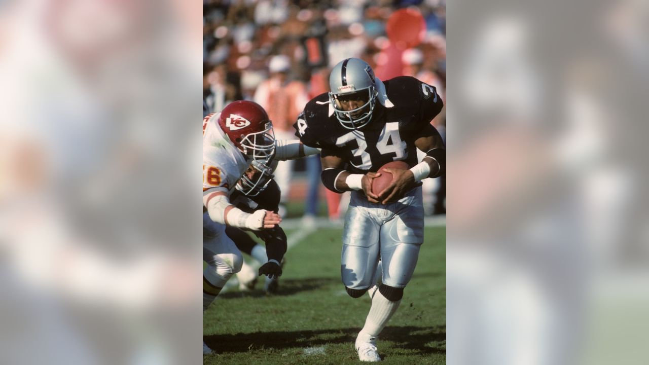 25 Nov. 1990: Los Angeles Raiders running back Bo Jackson (34) in action  during a game against the Kansas City Chiefs played at the Los Angeles  Memorial Coliseum in Los Angeles, CA. (