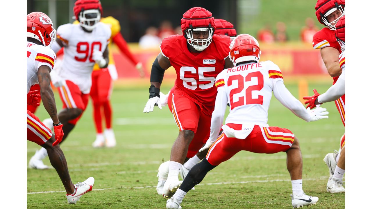 Kansas City Chiefs' Isaiah Norman (46) and Anthony Cook (47) walk