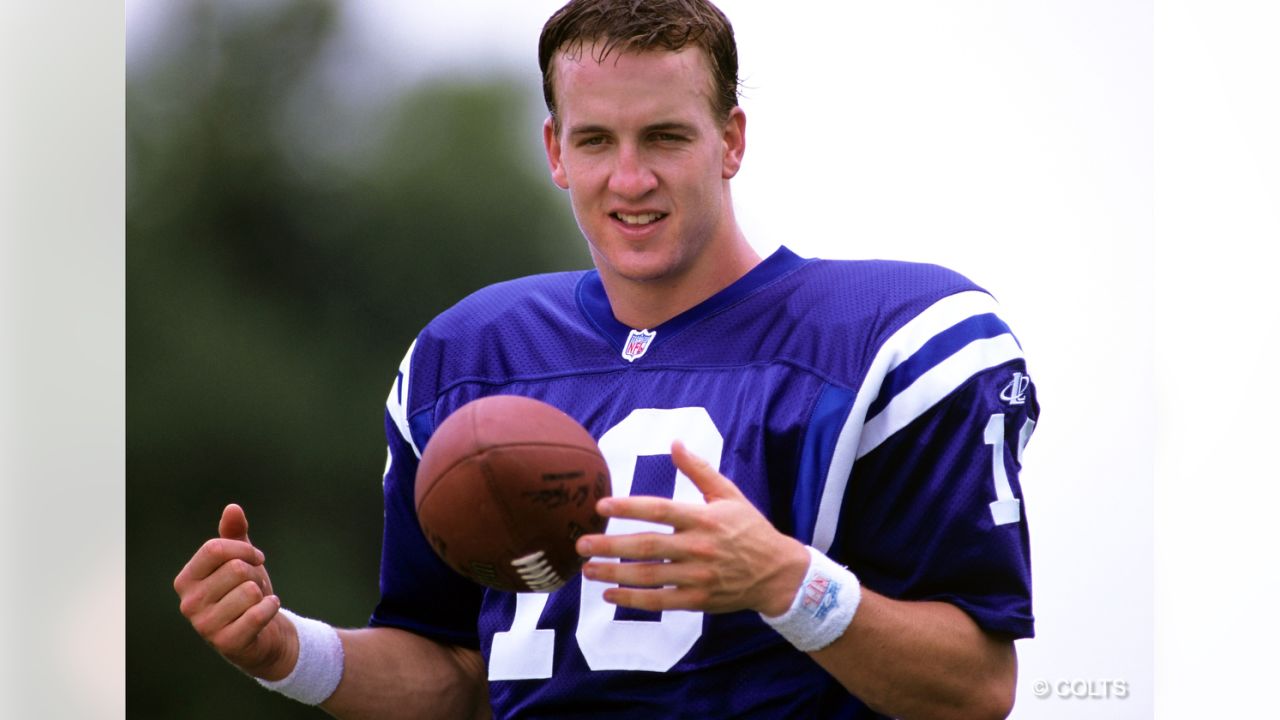 Indianapolis Colts quarterback Peyton Manning (18) throws the ball