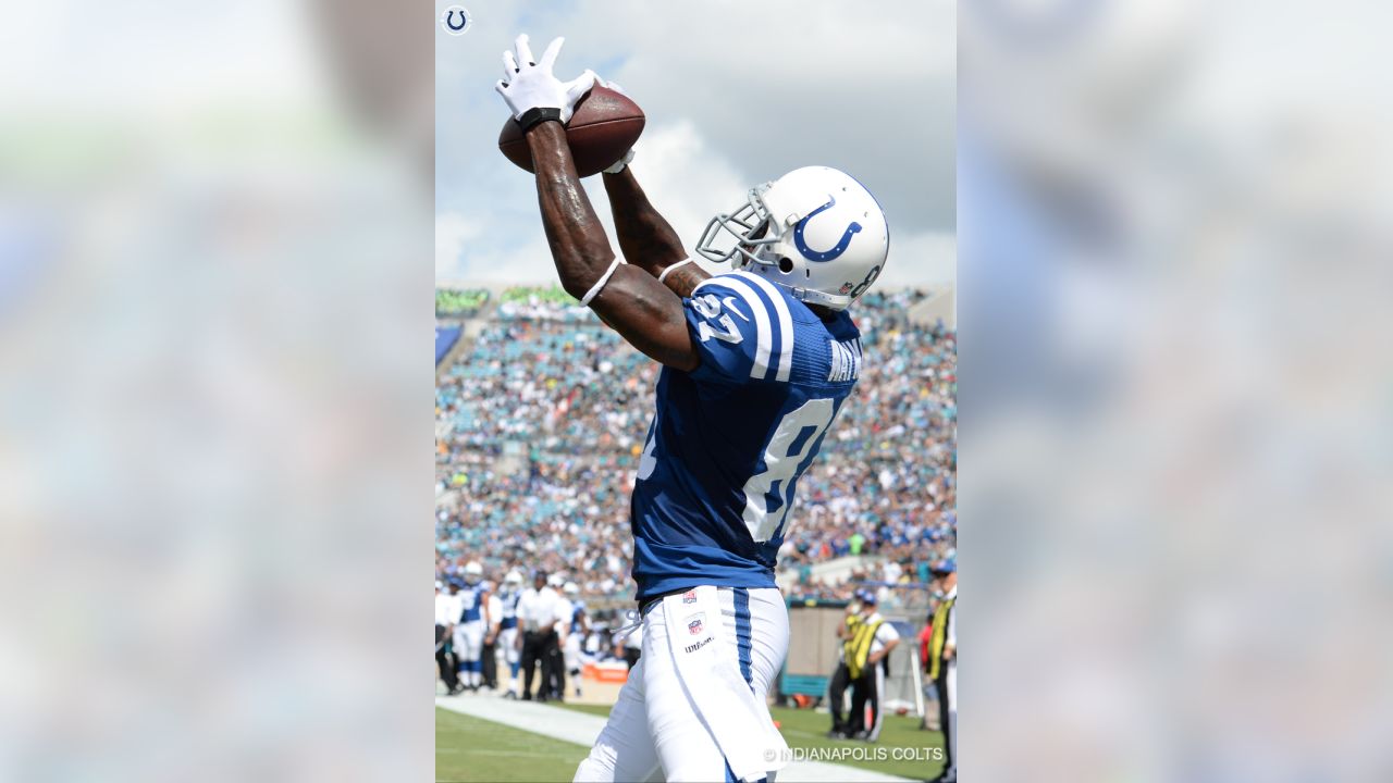 Indianapolis colts reggie wayne runs hi-res stock photography and