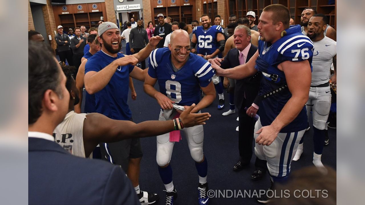 Andrew Luck shows Matt Hasselbeck how he draws defenders offside