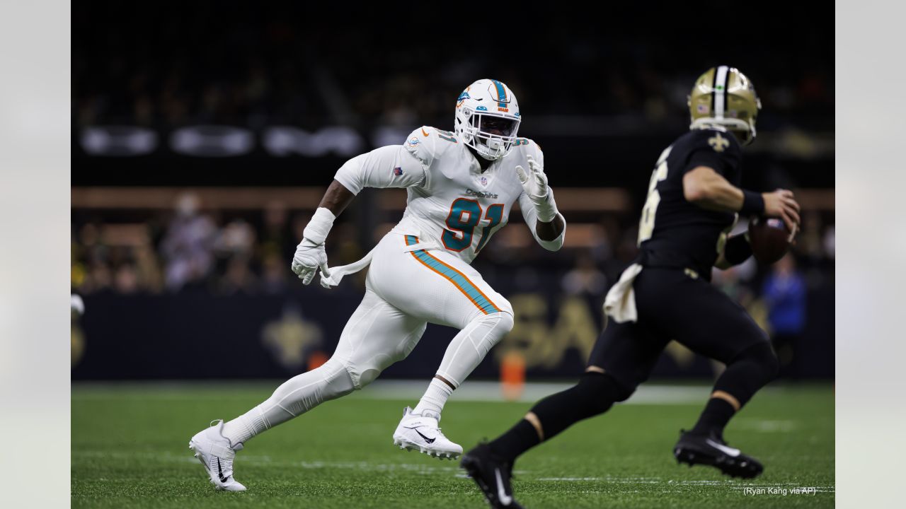 New York Jets running back Michael Carter (32) warms up before taking on  the Miami Dolphins during an NFL football game Sunday, Oct. 9, 2022, in  East Rutherford, N.J. (AP Photo/Adam Hunger