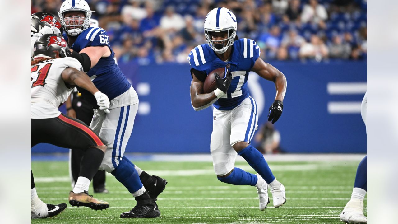 Indianapolis Colts running back D'Vonte Price (27) warms up on the