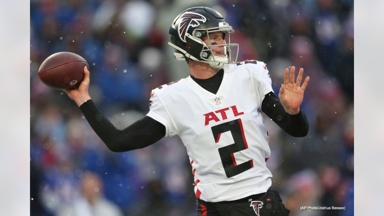 First look: Recently acquired quarterback Matt Ryan holds his new  Indianapolis Colts jersey following his trade away from the Atlanta Falcons.