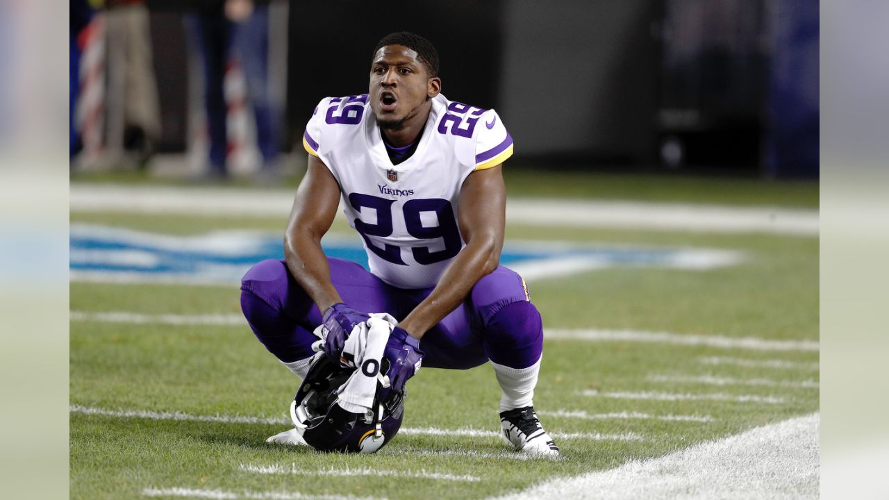 FILE - In this Oct. 24, 2019, file photo, Minnesota Vikings cornerback  Xavier Rhodes (29) breaks up a pass intended for Washington Redskins wide  receiver Terry McLaurin (17) during the first half