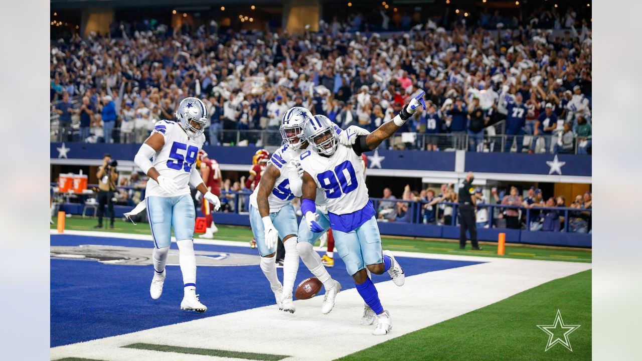 Dallas Cowboys quarterback Dak Prescott (4) looks to pass during a  Thanksgiving day NFL football game against the Las Vegas Raiders, Thursday,  Nov. 25, 2021, in Arlington, Texas. (AP Photo/Matt Patterson Stock