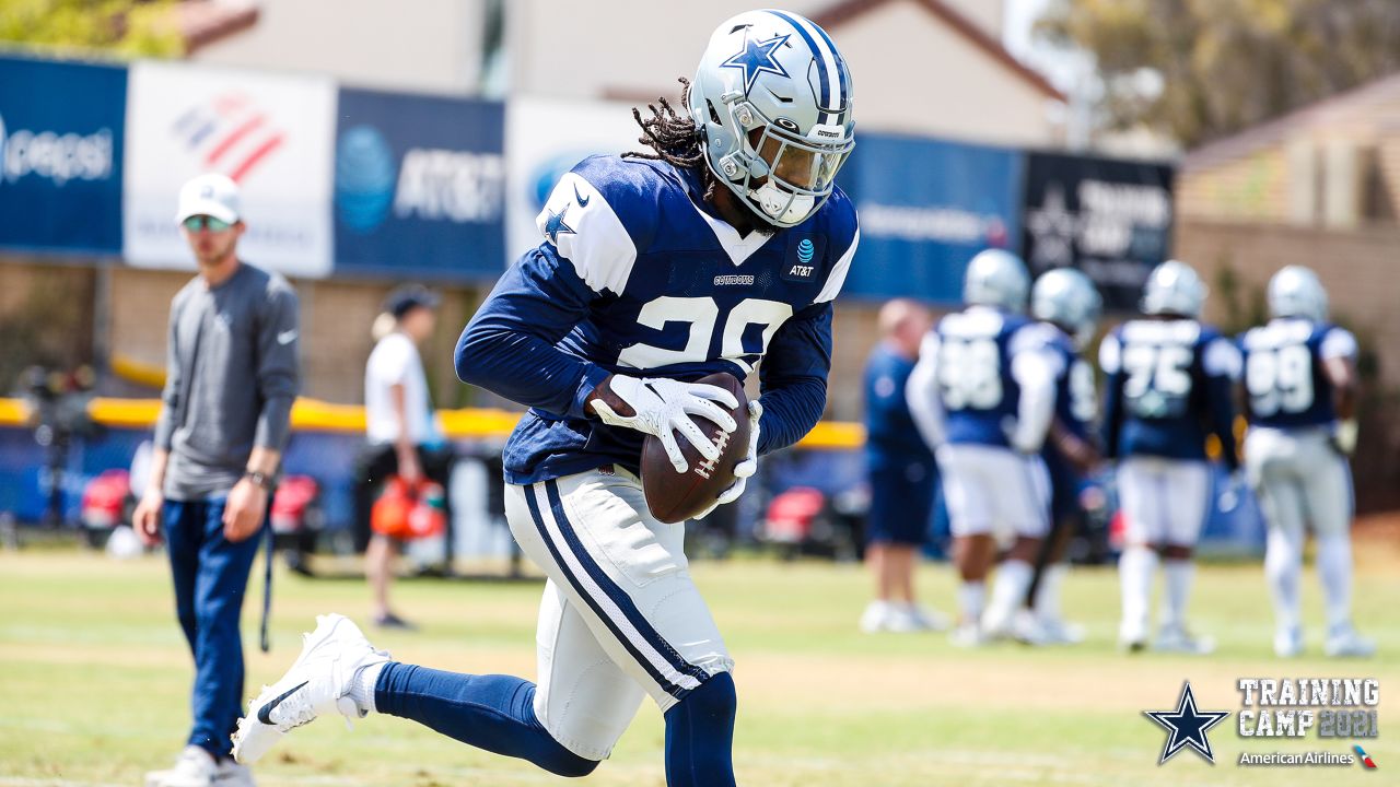 Safety (28) Malik Hooker of the Dallas Cowboys warms up before