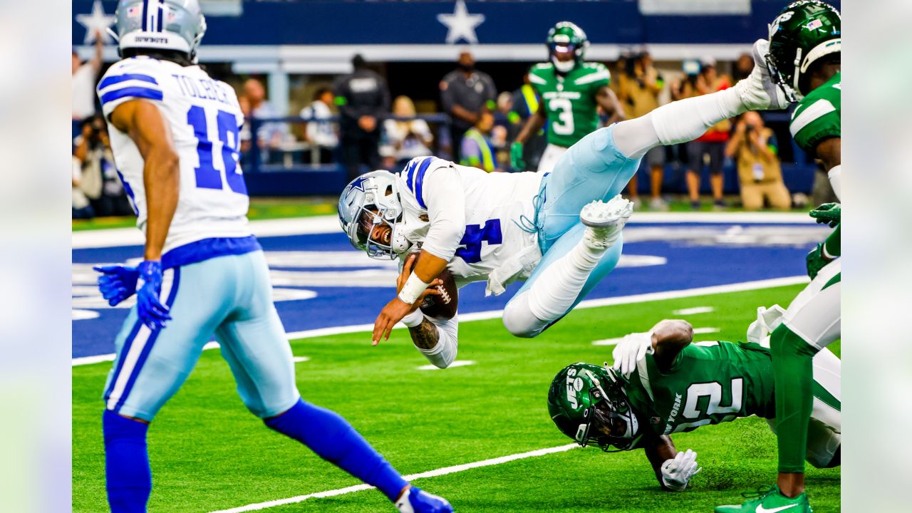 Dallas Cowboys quarterback Dak Prescott looks to pass during the first half  of an NFL football game against the New York Jets, Sunday, Sept. 17, 2023  in Arlington, Texas. (AP Photo/Sam Hodde