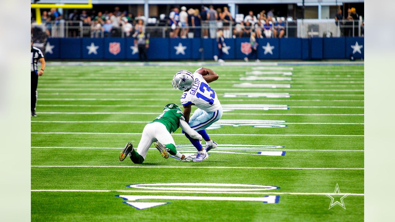 Dallas Cowboys tight end Jake Ferguson scores passes New York Jets  cornerback Sauce Gardner and linebacker Quincy Williams during the first  half of an NFL football game in Arlington, Texas, Sunday, Aug.