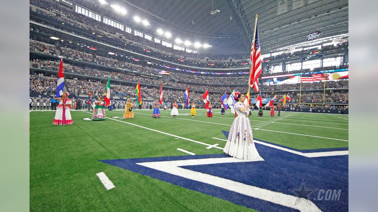 Fans celebrating Hispanic Heritage Month watch the Miami Dolphins and  Dallas Cowboys warm up before a NFL football game in Arlington, Texas,  Sunday, Sept. 22, 2019. (AP Photo/Ron Jenkins Stock Photo - Alamy