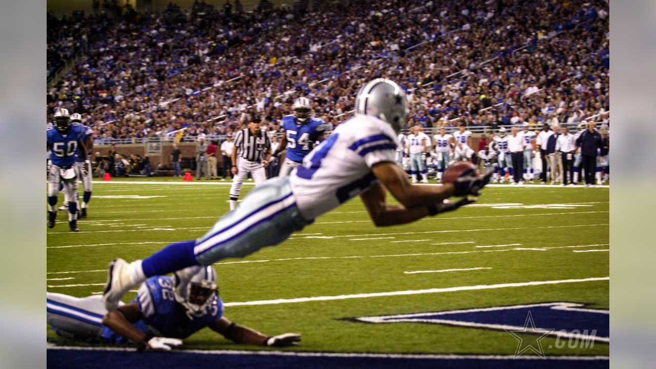 Wide receiver Terry Glenn, of the Dallas Cowboys, returns a pass down  field, in the 3rd quarter, as the Dallas Cowboys face the New England  Patriots, at Gillette Stadium, in Foxboro, Mass