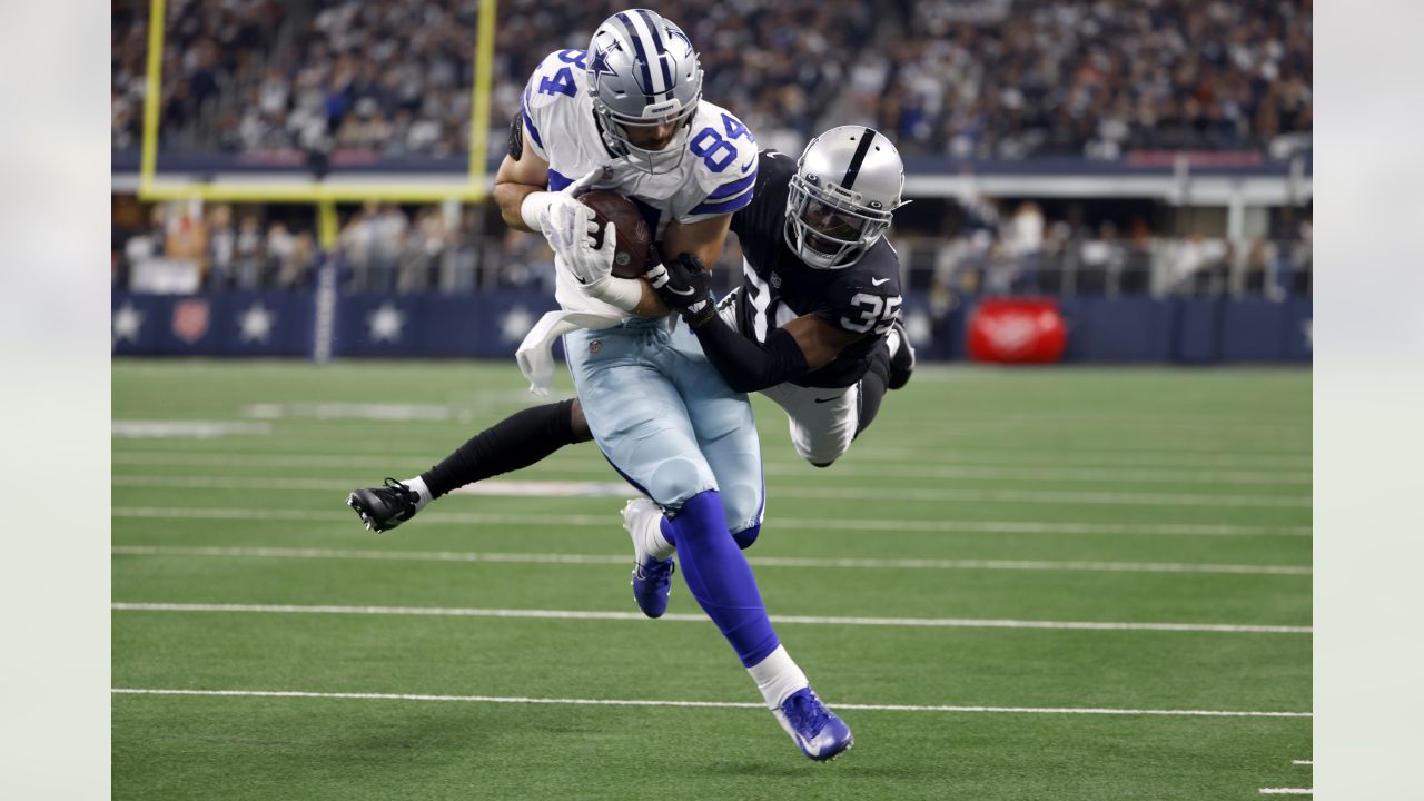 Dallas Cowboys quarterback Dak Prescott (4) looks to pass during a  Thanksgiving day NFL football game against the Las Vegas Raiders, Thursday,  Nov. 25, 2021, in Arlington, Texas. (AP Photo/Matt Patterson Stock