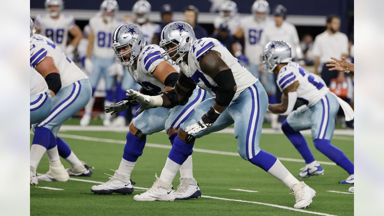 Helmets and gloves of a Dallas Cowboys and Philadelphia Eagles player, on  the field after their NFL football game, Sunday, Nov. 19, 2017, in  Arlington, Texas. (AP Photo/Michael Ainsworth Stock Photo - Alamy