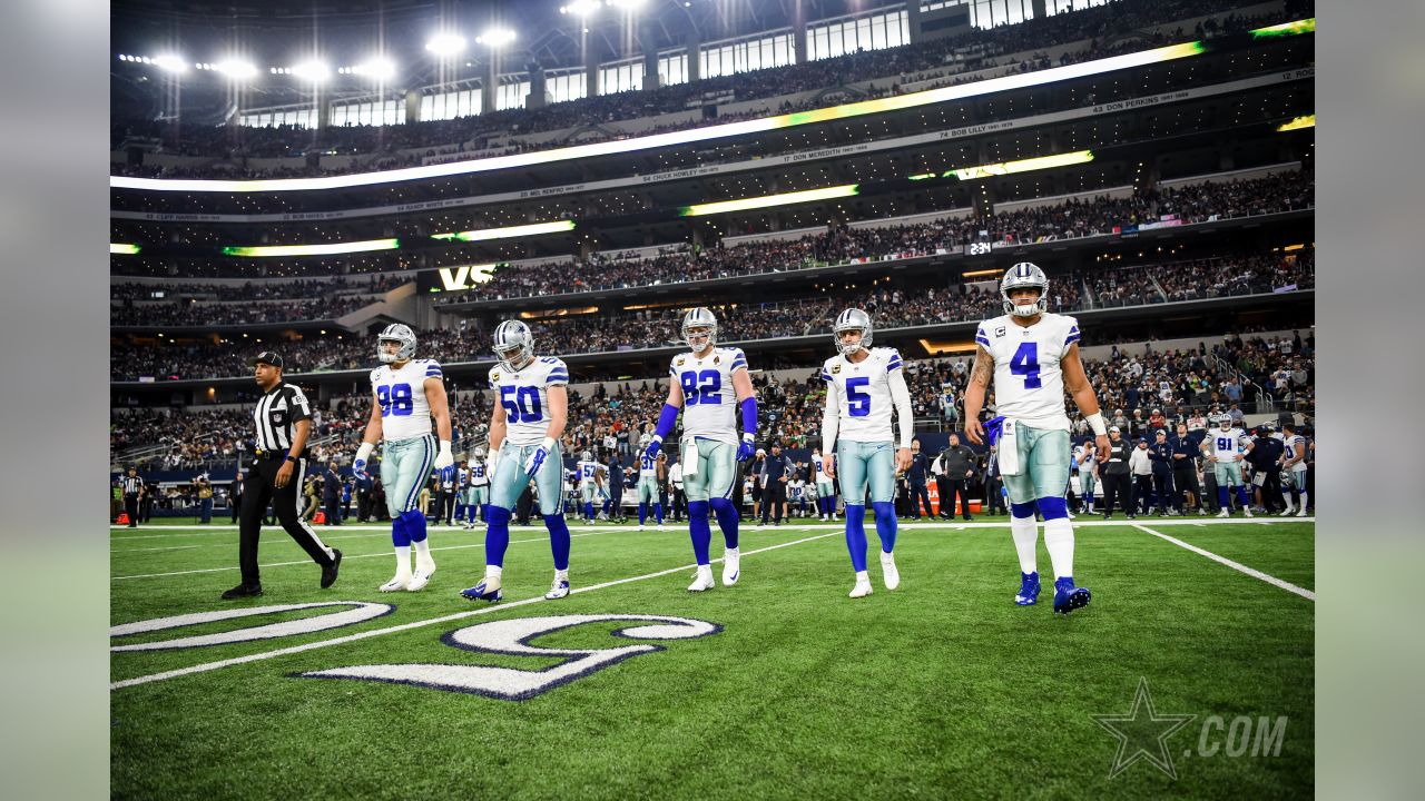 A fan waves a Dallas Cowboys flag before a preseason NFL football game  between the Seattle Seahawks and the Cowboys, Saturday, Aug. 19, 2023, in  Seattle. (AP Photo/Lindsey Wasson Stock Photo - Alamy