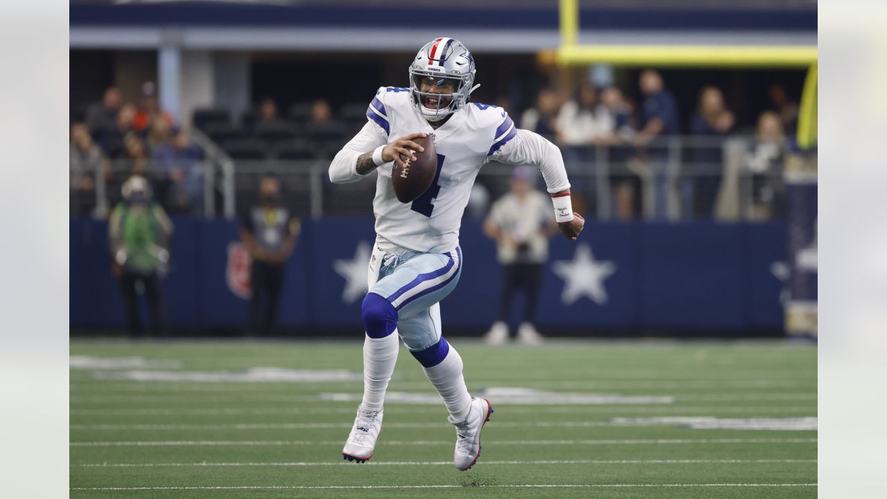 A Dallas Cowboys helmet with salute to service decals sits on the field  before an NFL football game against the Denver Broncos, Sunday, Nov. 7,  2021, in Arlington, Texas. (AP Photo/Matt Patterson