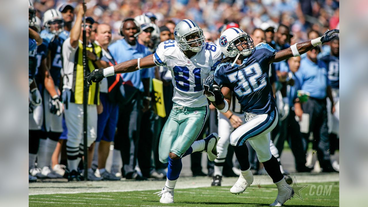 Dallas Cowboys Miles Austin raises the ball in celebration after scoring a  touchdown against the Arizona Cardinals in the fourth quarter of the  Cardinals-Cowboys game at University of Phoenix Stadium in Glendale