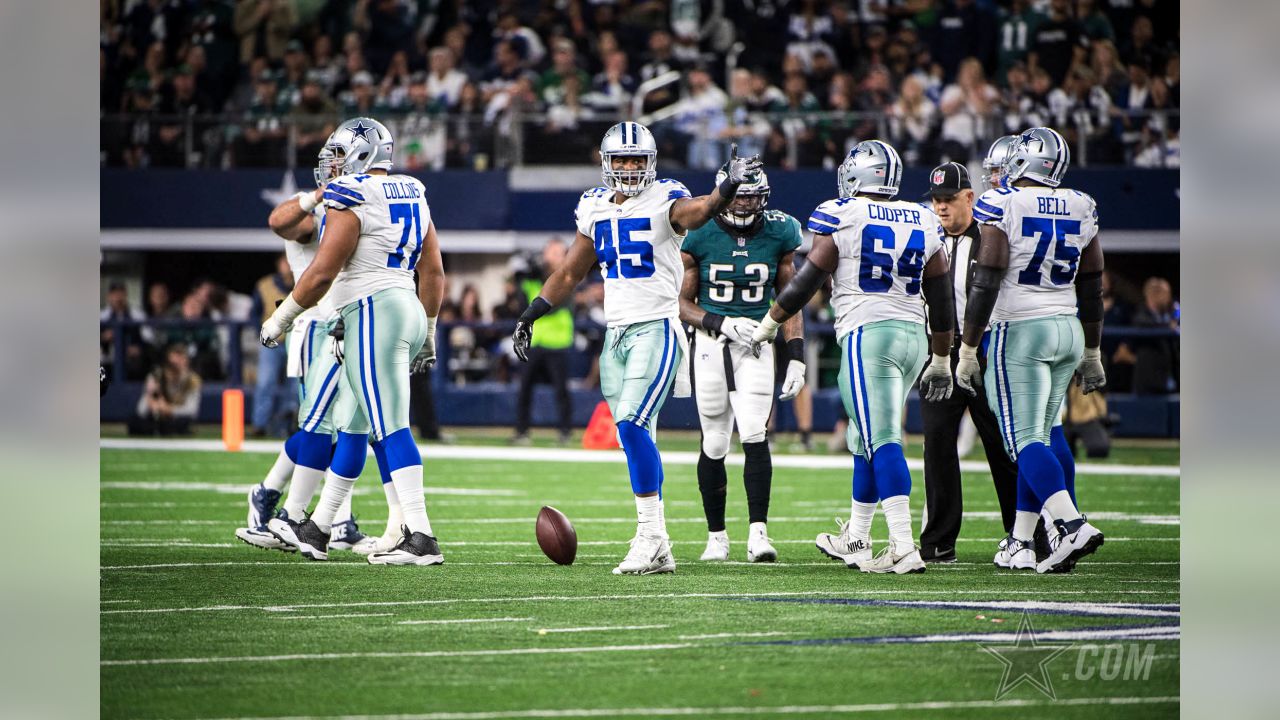 Dallas Cowboys fullback Keith Smith (41) spikes the football after