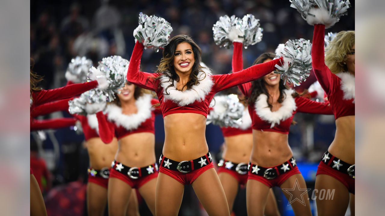 Dallas Cowboys Cheerleaders perform their annual Christmas themed halftime  show during the Cowboys and Green Bay Packers game at AT&T Stadium in  Arlington, Texas on December 15, 2013. The Packers rallied from