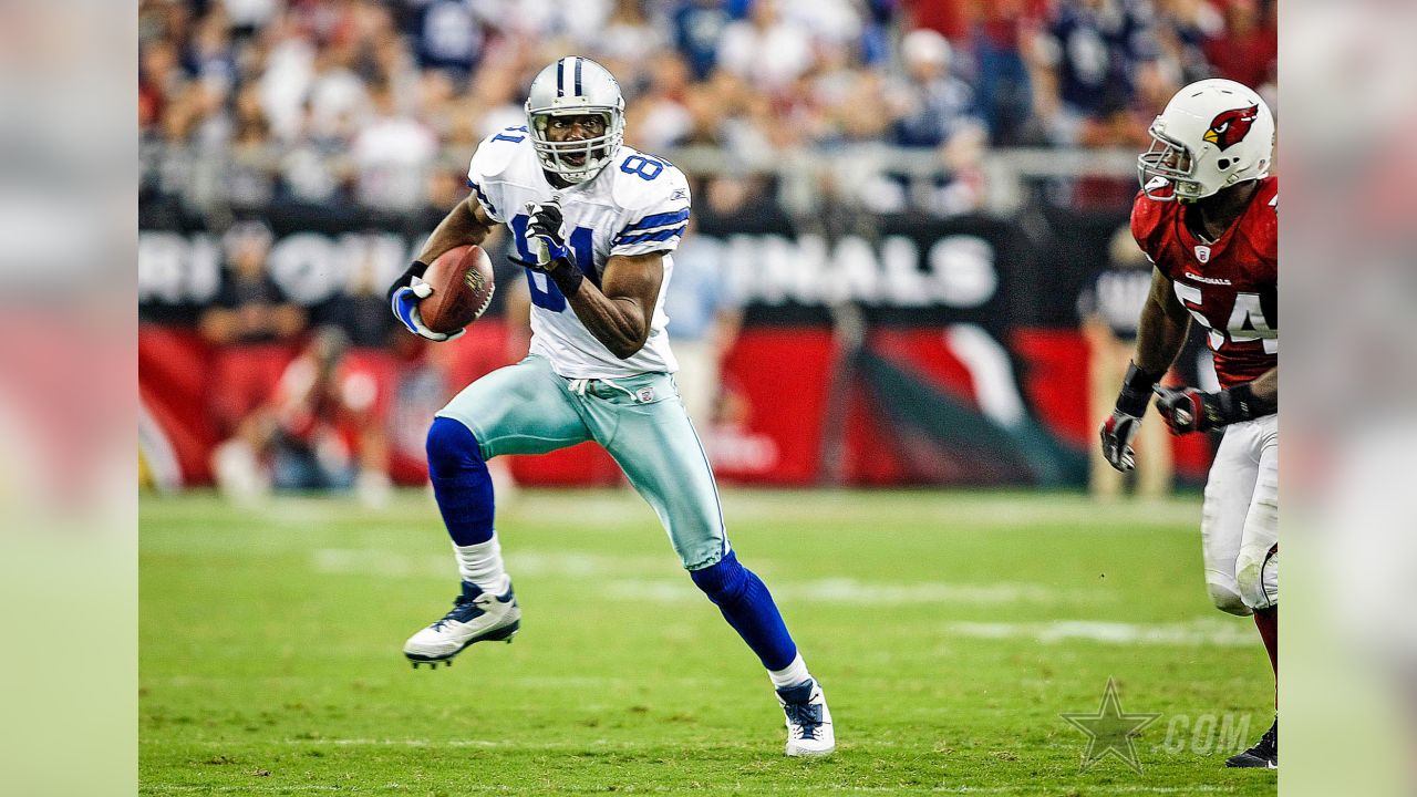 FILE ** Dallas Cowboys receiver Terrell Owens (81) walks off the field  following a practice session