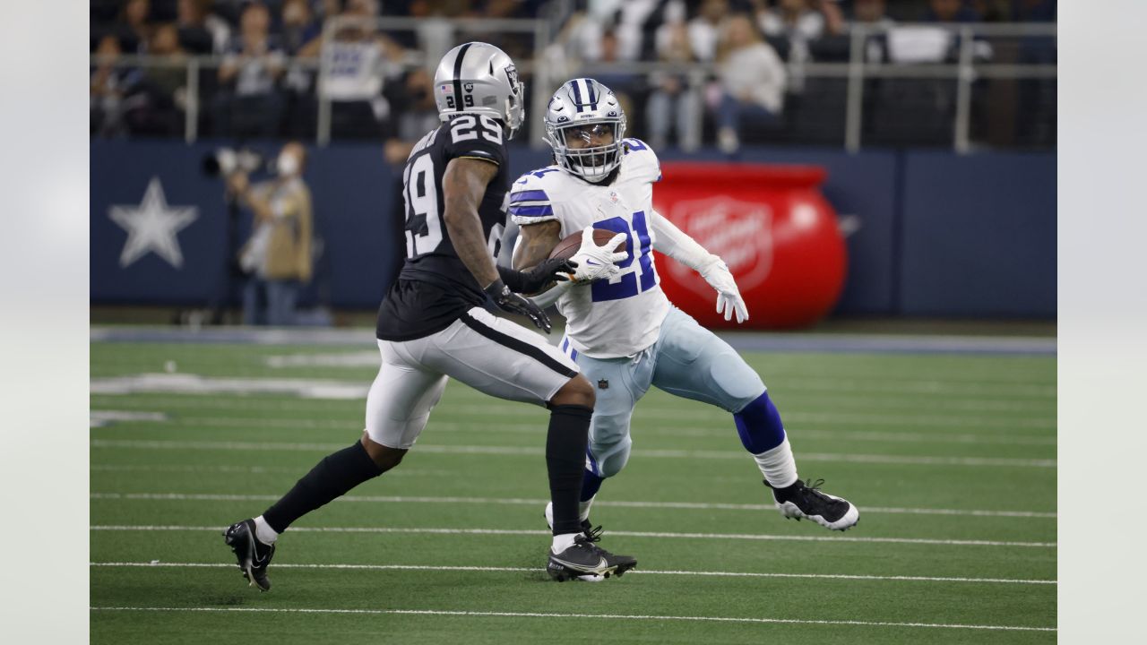 Dallas Cowboys quarterback Dak Prescott (4) looks to pass during a  Thanksgiving day NFL football game against the Las Vegas Raiders, Thursday,  Nov. 25, 2021, in Arlington, Texas. (AP Photo/Matt Patterson Stock