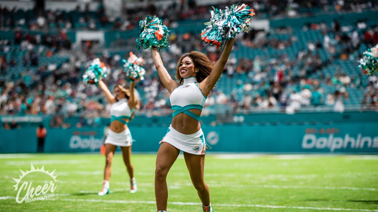 Miami Dolphins Cheerleaders entertain the crowd in Christmas attire during  the first half against the Buffalo Bills at Sun Life Stadium on December  23, 2012 in Miami, Florida. The Miami Dolphins beat