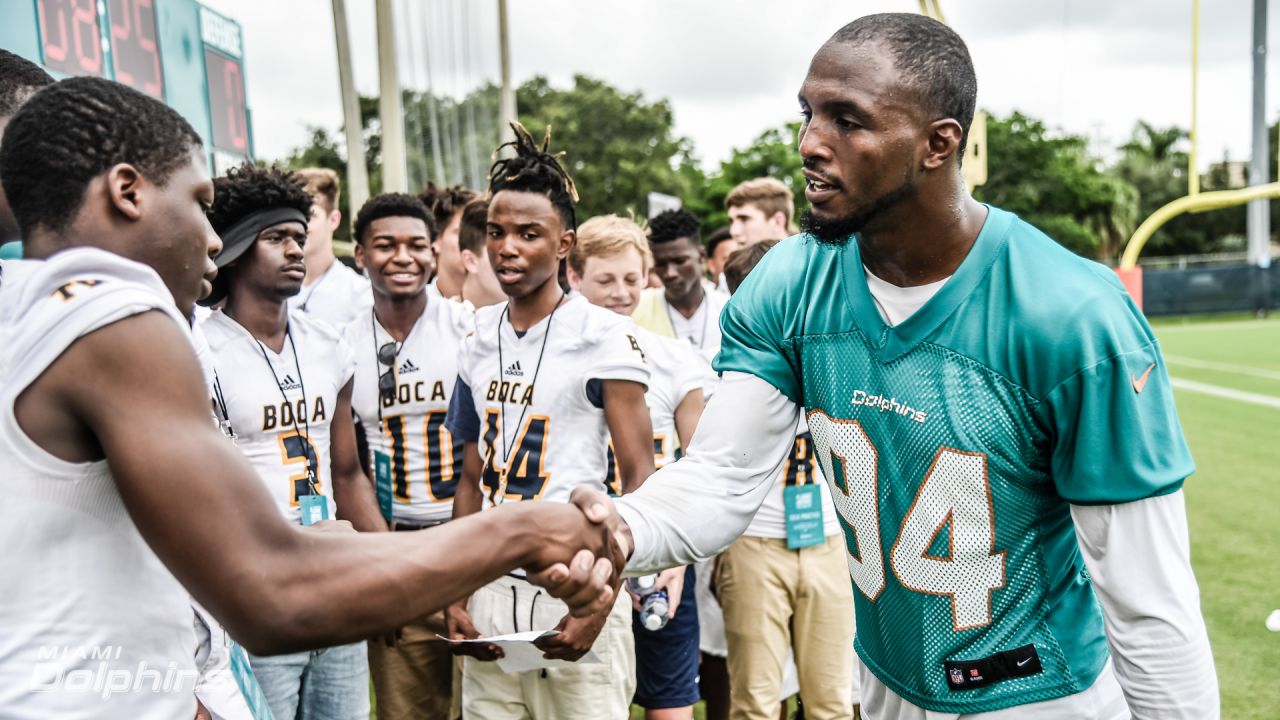 Boca High football team gets special Dolphins visit