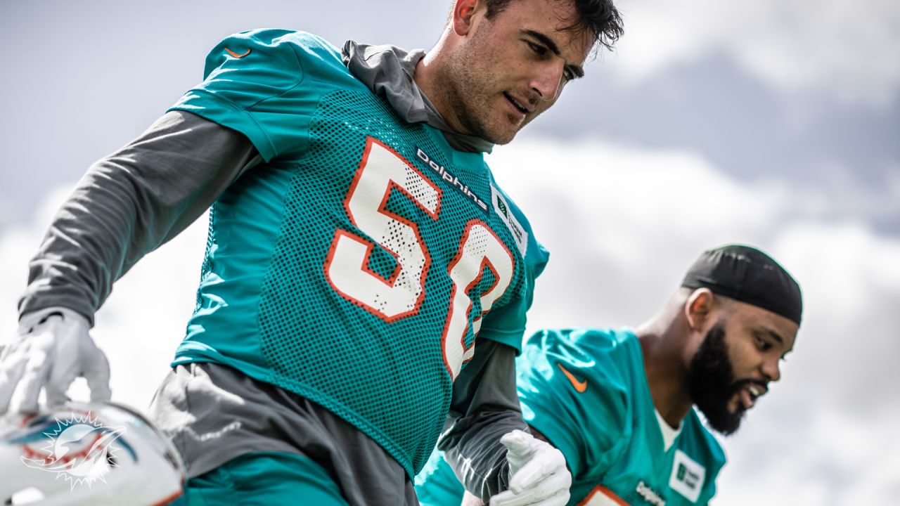 Miami Dolphins linebacker Calvin Munson does drills during NFL