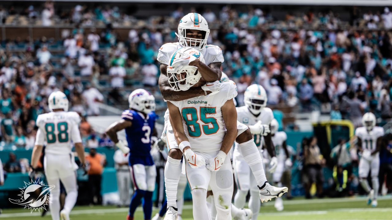 Buffalo Bills vs. Miami Dolphins. NFL Game. American Football League match.  Silhouette of professional player celebrate touch down. Screen in backgrou  Stock Photo - Alamy