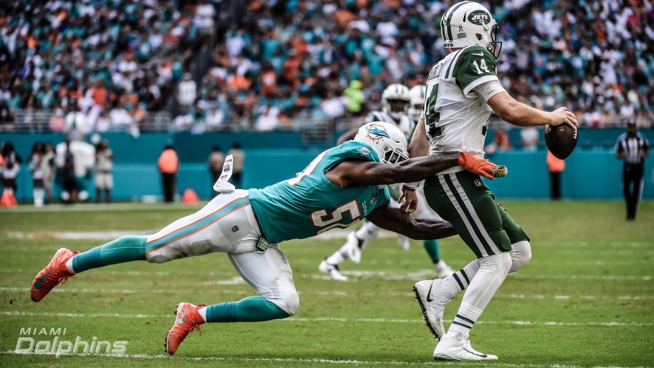 View photos from the Dolphins vs. Jets game.