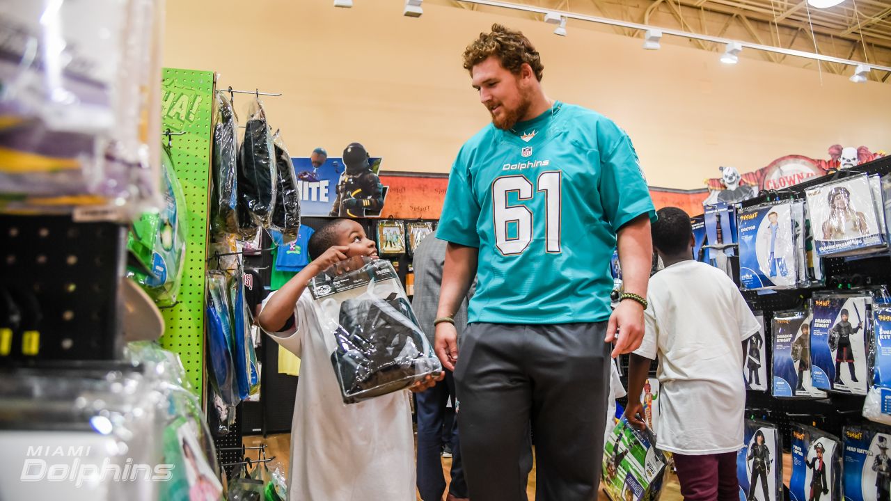 Dolphins Take Elementary School Students to Halloween Shop With A Fin  Presented by Dade County Federal Credit Union