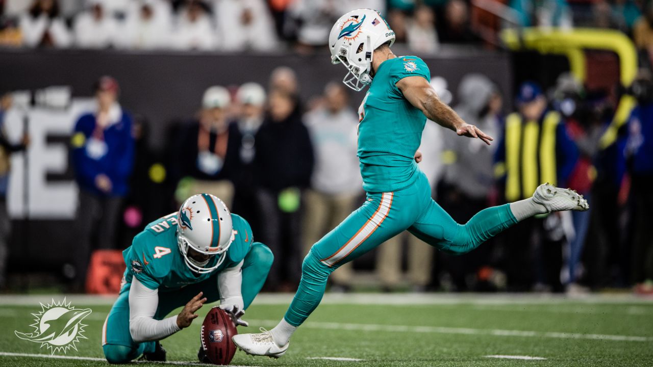 Miami Dolphins vs. Cincinnati Bengals. NFL Game. American Football League  match. Silhouette of professional player celebrate touch down. Screen in  bac Stock Photo - Alamy