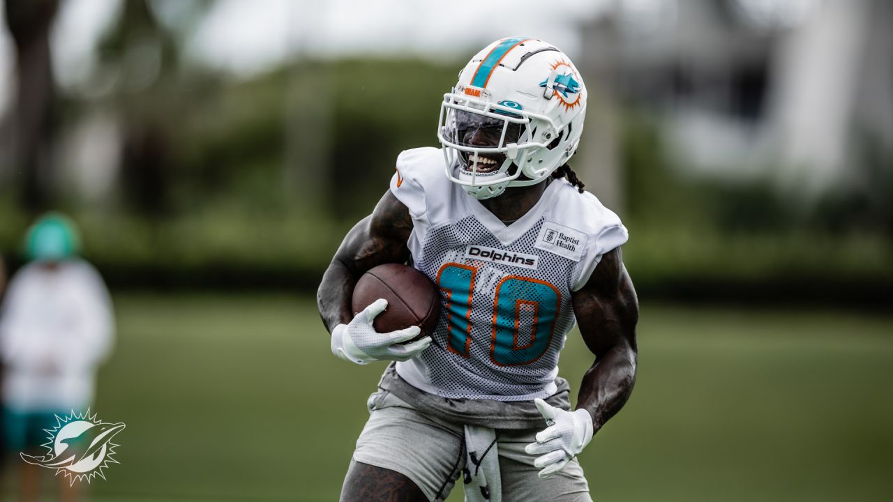 Miami Dolphins wide receiver Tyreek Hill (10) looks on during NFL football training  camp at Baptist Health Training Complex in Hard Rock Stadium on Thursday,  Sept. 1, 2022 in Miami Gardens, Fla. (